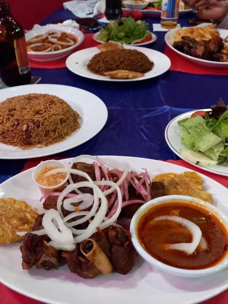 Fried Turkey Fish Conch Lanbi Chicken Plantains Black Mushroom Rice Diri a Djondjon